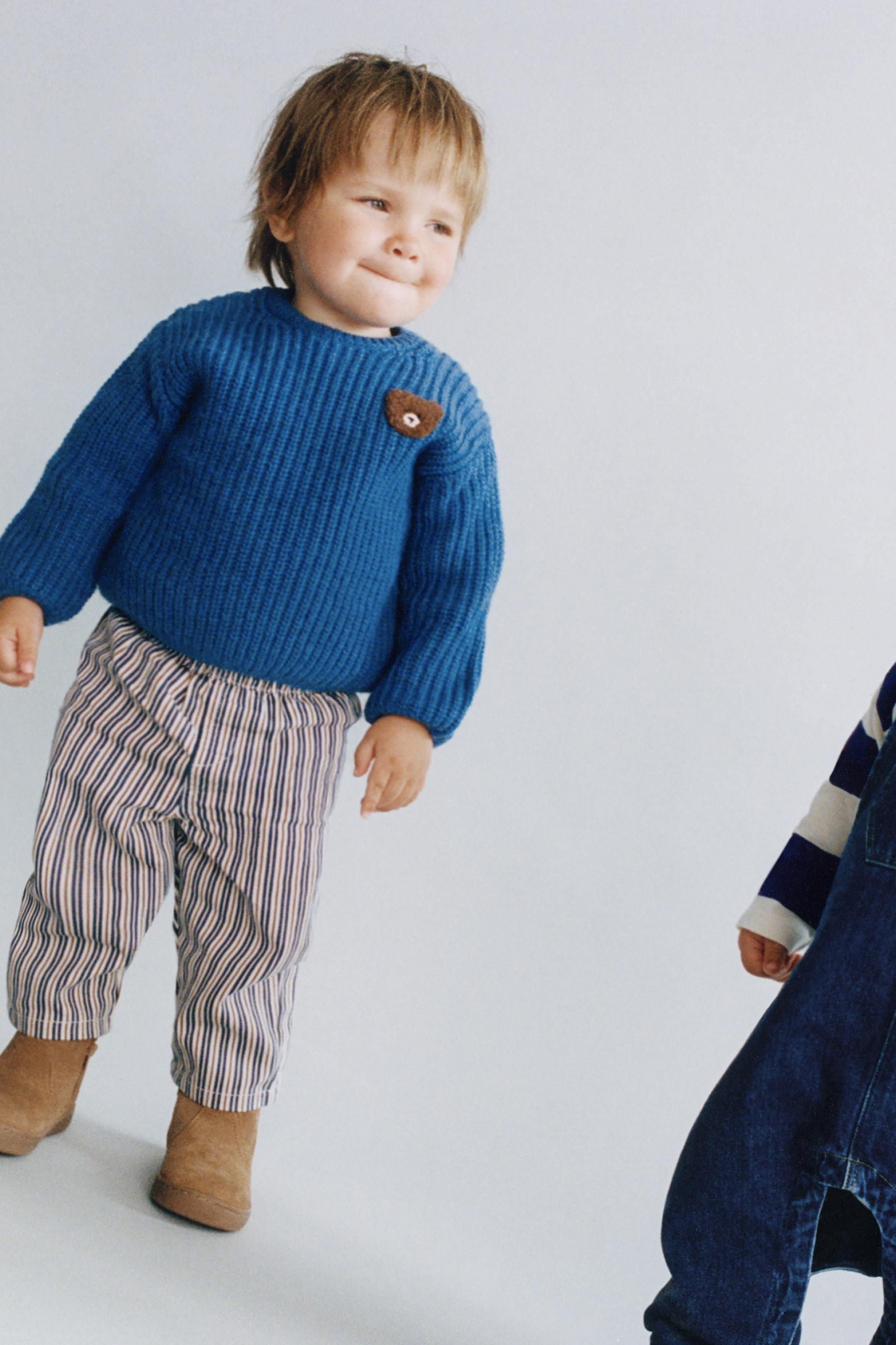 PULL EN MAILLE À PIÈCE OURS